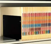 Fixed shelves feature movable dividers to keep files neat and organized. Standard 2 dividers per tier.