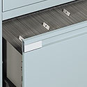 Lateral filing drawers come standard with side-to-side filing bars.